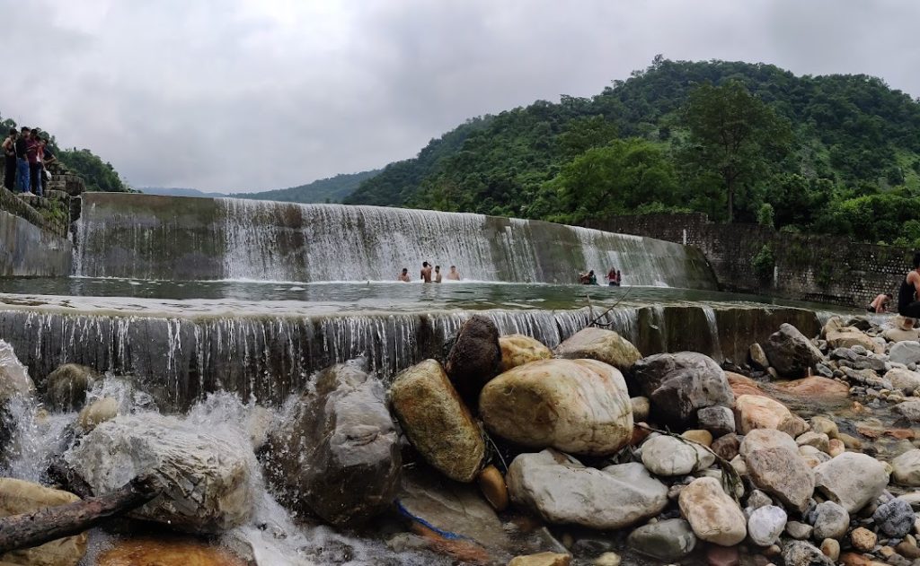 scenic waterfall near The Palatial Homes dehradun